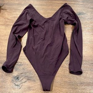EUC (worn 4-5 times). Lululemon sleeve bodysuit in black cherry (burgundy-brown)
